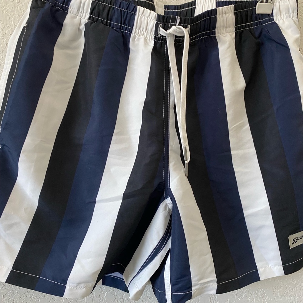 Brother mens swin trunks. Size S/P. Striped are navy/black and white.